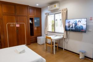 TV a/nebo společenská místnost v ubytování Seven Rabbit House