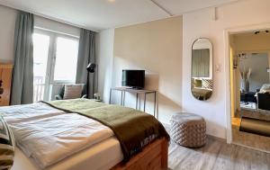 Posteľ alebo postele v izbe v ubytovaní SPOTLIGHT 4YOU City Apartment with parking by belle-stay