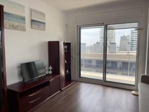 Μια τηλεόραση ή/και κέντρο ψυχαγωγίας στο Rengle Horizonte Penthouse & Pool