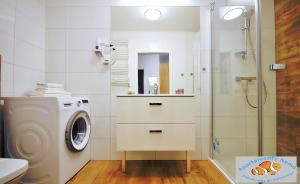Kúpeľňa v ubytovaní SPA Polanki PARK Nemo Apartamenty Kołobrzeg