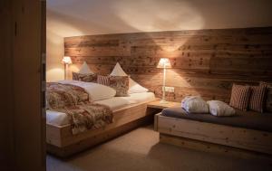 Łóżko lub łóżka w pokoju w obiekcie Chalet Tannenhof