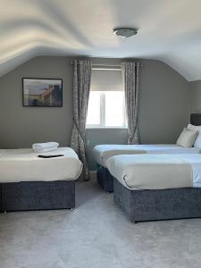 Letto o letti in una camera di Glasha Meadows Accommodation