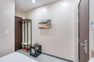 Postel nebo postele na pokoji v ubytování Hoàng Quỳnh Hotel