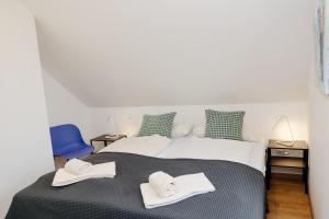 En eller flere senge i et værelse på nice2be Violet - Augsburg Zentrum