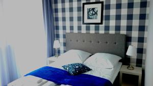 Posteľ alebo postele v izbe v ubytovaní Willa Długa No. 4 Bed & Breakfast