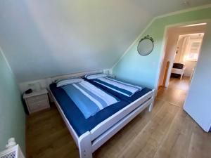 Postel nebo postele na pokoji v ubytování Friesendrööm