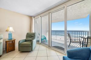 a living room with a view of the ocean at Romar Tower Unit 8C in Orange Beach