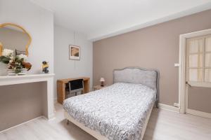 Katil atau katil-katil dalam bilik di Duplex centre Saint-Girons +5 gambar