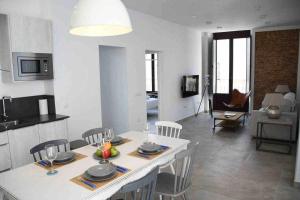 Μια τηλεόραση ή/και κέντρο ψυχαγωγίας στο IX B Apartamentos Morales & Arnal