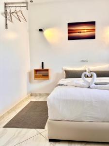 Postel nebo postele na pokoji v ubytování Hotel apartment america