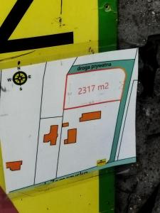 a sign on a wall with a streetpyramid at Poland all city luxry hotele apartament and houses in Biechówko