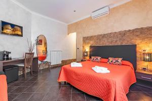 Alis Laura guest house - 150m from piazza bologna metro and 10 minutes from the Colosseum tesisinde bir odada yatak veya yataklar