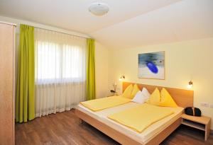 Postel nebo postele na pokoji v ubytování Residence Mignon