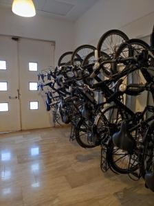 a bunch of bikes parked in a room at Close to the sea, large 170 m2 apartmentBIKES in Valencia