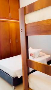 a couple of bunk beds in a room at Mirador del Laguito 13003 in Cartagena de Indias +12 photos