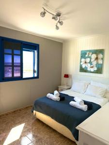 Ένα ή περισσότερα κρεβάτια σε δωμάτιο στο Casa del Sur good vibes only