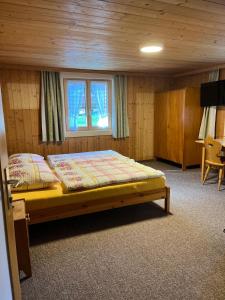 Postel nebo postele na pokoji v ubytování Haus Waldegg 84
