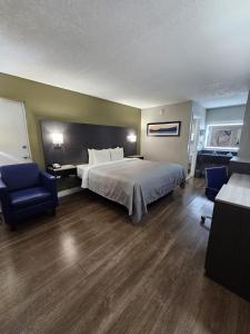 Ένα ή περισσότερα κρεβάτια σε δωμάτιο στο Quality Inn near Blue Spring +5 φωτογραφίες