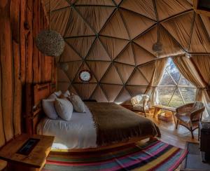 Postel nebo postele na pokoji v ubytování Ecocamp Patagonia + 37 fotografií