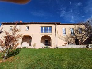 a large house with a yard in front of it at Santo Stefano Rondini in Vicoforte +14 photos