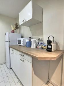 Η κουζίνα ή μικρή κουζίνα στο Côté Cour de Miss K +6 φωτογραφίες