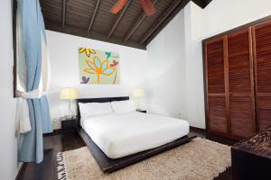 Serendipity Holistic Resort Spa客房内的一张或多张床位