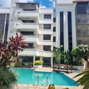 Bazén v ubytování Hotel Condominio Casa Blanca nebo v jeho okolí