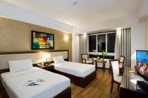 TV a/nebo společenská místnost v ubytování Starlet Hotel