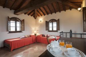 Postel nebo postele na pokoji v ubytování Agriturismo Ragoncino