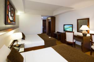 Postel nebo postele na pokoji v ubytování Starlet Hotel + 37 fotografií