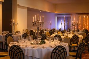Veitingastaður eða matsölustaður á Louis Fitzgerald Hotel