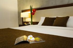 Postel nebo postele na pokoji v ubytování Starlet Hotel