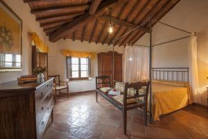 Postel nebo postele na pokoji v ubytování Agriturismo Ragoncino