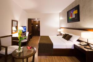 Postel nebo postele na pokoji v ubytování Starlet Hotel