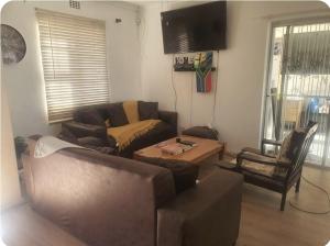 Et opholdsområde på Lifestyl Cottage