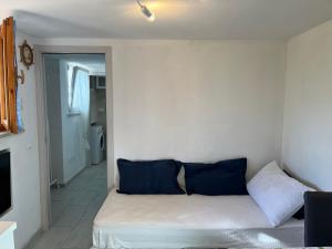 Postel nebo postele na pokoji v ubytování La Conchiglia sul Mare