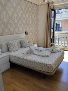 Hostal New Dream Madrid客房内的一张或多张床位