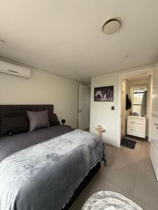 Postel nebo postele na pokoji v ubytování Pebble Haven Umhlanga