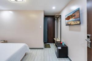 TV a/nebo společenská místnost v ubytování Hoàng Quỳnh Hotel