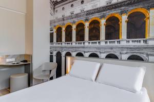 Postel nebo postele na pokoji v ubytování B&B Hotel Roma Pietralata Tiburtina