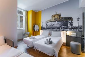 Postel nebo postele na pokoji v ubytování B&B Hotel Roma Pietralata Tiburtina