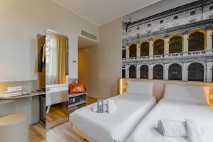 Postel nebo postele na pokoji v ubytování B&B Hotel Roma Pietralata Tiburtina