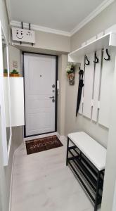Кровать или кровати в номере NicePlace on Tulebaev street