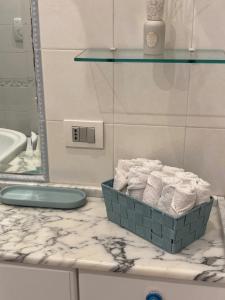 a bathroom with a basket of towels on a counter at Rhome country lodge in La Massimina-Casal Lumbroso +92 photos