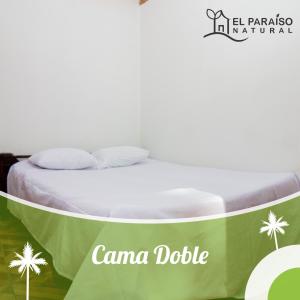Postel nebo postele na pokoji v ubytování Cabaña el Guayabal