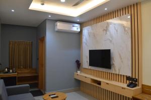 TV a/nebo společenská místnost v ubytování JBR Residency