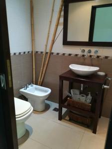 Phòng tắm tại Simonahousechascomus