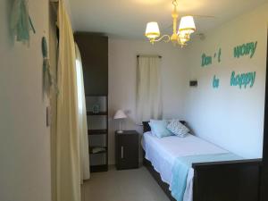 Giường trong phòng chung tại Simonahousechascomus +15 ảnh