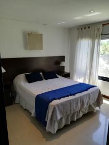 Giường trong phòng chung tại Simonahousechascomus