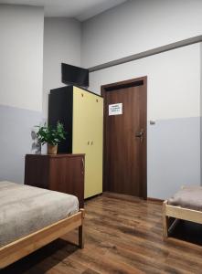 Postel nebo postele na pokoji v ubytování Willa Wiekowa Sosna